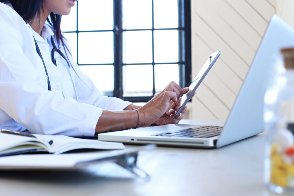 doctor wearing white robe stethoscope