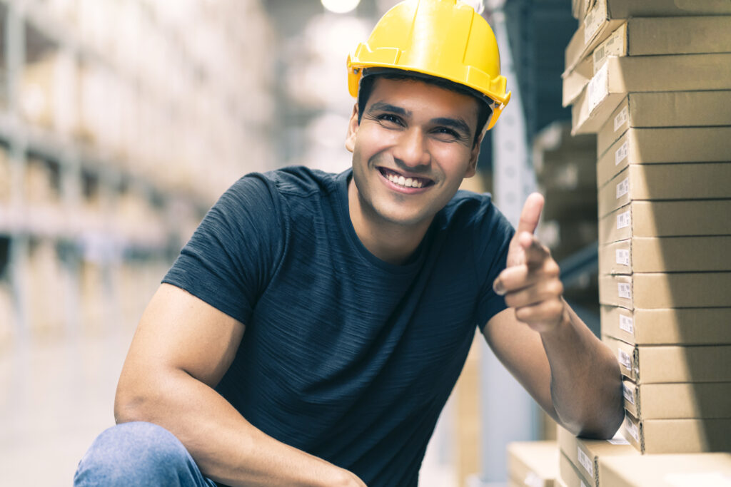 smart indian engineer man wearing safety helmet doing stock tick check cardboard stock product management factory warehouse background 1024x683 2