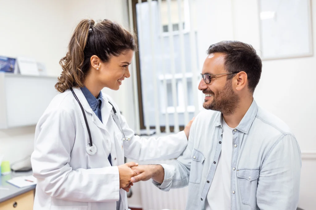 young woman doctor gp white medical uniform consult male patient private hospital female therapist s 1024x683 7